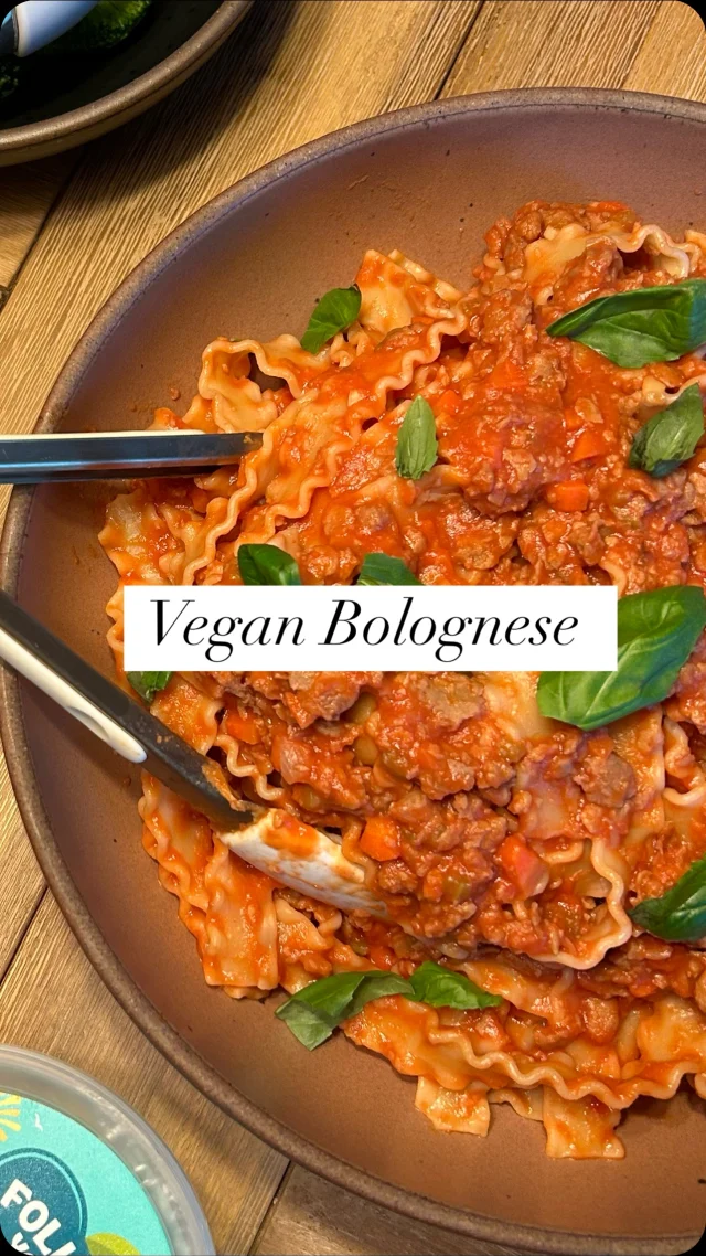 Easy #Vegan Bolognese 🍝

I’ve been making this vegan meat sauce a lot lately because it’s so easy and the boys love it! Here’s a rough idea on how to make it.

Ingredients 
Olive Oil
Soffritto (1 shallot or small onion, 1 carrot, 1 celery stalk — finely chopped)
1 package @beyondmeat plant-based ground
1 jar tomato passata (plus some water)
1 lb pasta of your choice
Salt & Sugar to taste
Vegan parm for serving

Directions
Sauté soffritto in olive oil until soft
Add Beyond Meat and cook 5-8 minutes 
Add passata (plus some water)
Season with salt (to taste) & sugar (~1tsp)
Simmer for 10 minutes or so
Cook pasta al dente
Add pasta to sauce and toss to coat (add pasta water as needed)
Enjoy with basil and vegan parmesan if desired!

#plantbased #whatveganseat #veganpasta #veganfoodshare #veganitalianfood #plantprotein #vegandinner #beyondmeat #mafaldine
